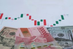 Rupiah masih terkoreksi pada Jumat siang