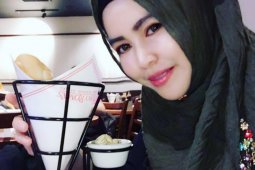 Nola Zain Salman, warga Singapura yang soroti wanita Banjar