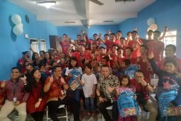 WOM Finance ajak anak panti asuhan rayakan Natal bersama