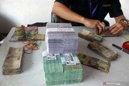 Penukaran uang di terminal