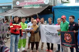 Adaro and partners distribute assistance for flood victims