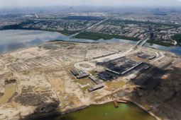 News Feature --  Fate of Jakarta's giant sea embankment as a flood barrier