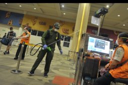 Penyemprotan COVID-19 di Bandara Ngurah Rai