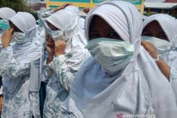 WHO: Anak 12 tahun ke atas harus pakai masker seperti orang dewasa