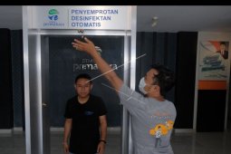 Pengembangan gerbang penyemprot disinfektan otomatis