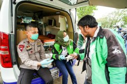 Cegah penyebaran COVID-19, Gojek lengkapi mitra masker, antiseptik dan vitamin