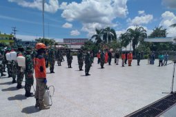 Kodim 1007 Bersama KNPI Melakukan Penyemprotan Disinfektan