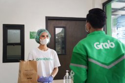 Grab buat program bantuan  untuk pengemudi hadapi corona