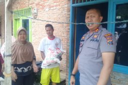 Kapolres Binjai berbagi di Jumat Barokah