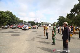Pemkab-Forkopimda gelar penyiraman disinfektan di titik vital Kota Pelaihari