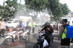 Sosialisasi dan Penyemprotan Disinfektan