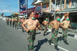 Koramil Penajam Jaga Stamina Dengan Berjemur dan Lari Jalanan