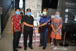 Pupuk Kaltim Salurkan Bantuan Antisipasi Covid-19 Tahap II di Bontang