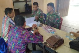 Personel  TMMD bertandang ke Kantor Desa Pandu Raya