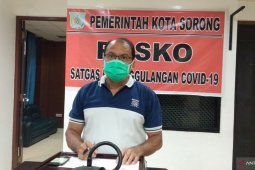 Sekeluarga dievakuasi masuk karantina gedung Diklat Kota Sorong
