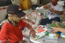 PMI distributes 40,000 food packages to COVID-19 affected