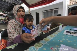 Penyaluran bantuan sosial tunai