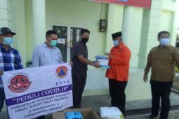 PP KSBWI Kukar Serahkan Bantuan APD Bagi Tenaga Medis