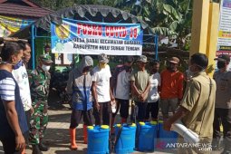 Meski Ramadhan, Tim Gugus Tugas COVID-19 HST terus lakukan sosialiasasi dan penyemprotan