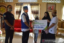 Sekda Bone Bolango serahkan santunan BPJamsostek