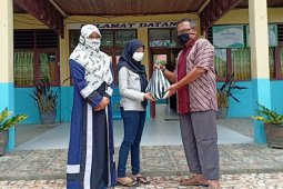 SMAN 1 Loa Kulu Bagikan 87 Paket Sembako Bagi Siswa Kurang Mampu