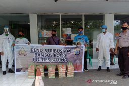 YNCI Bitung bersama polisi berbagi kasih kepada Medis-Masyarakat Terdampak COVID-19