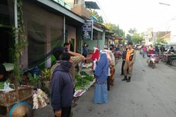 Pemkab Kediri intensifkan sosialisasi bahaya COVID-19 di pasar tradisional