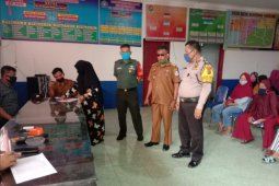 Polsek Batang Kuis awasi pembagian untuk 100 penerima BLT-DD