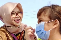 WHO: Anak usia 12 tahun ke atas harus menggunakan masker seperti orang dewasa
