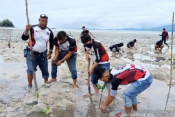 18 Komunitas Motor Manado Binaan Bold Riders Touring Bareng Lestarikan Pesisir Pantai Kalinaun