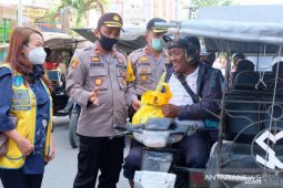 Sinergitas LCM-Polres Tanjungbalai, ratusan pengandara dapat bahan pangan dan panganan siap saji