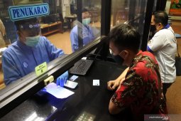 Penukaran uang baru pecahan 75.000