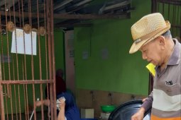 Bayam "dangis" di pasar Banjarmasin pada hari asyura