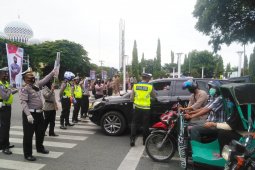 Polres Lhokseumawe bersama Forkompinda bagikan 10.000 masker tekan penyebaran COVID-19