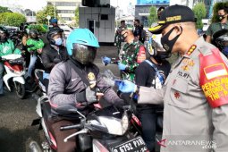 Jakarta Police distribute 5 million masks under public health campaign