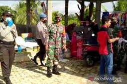 Kemitraan Polsek bersama Koramil Amuntai Utara tangkal COVID-19
