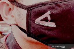 Masker dilapisi tisu, perlukah?