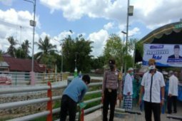 Bhabinkamtibmas sosialisasi adaptasi kebiasaan baru