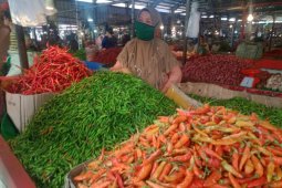 Harga kebutuhan pokok di pasar tradisional Angso duo relatif stabil
