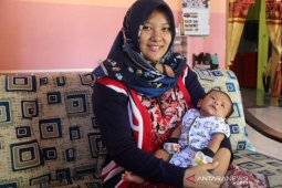 Dengan JKN, harapan Vany untuk persalinan normal terwujud