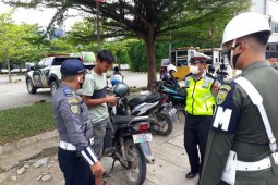 Tim Satgas Terpadu COVID-19 Kota Jambi gelar razia masker