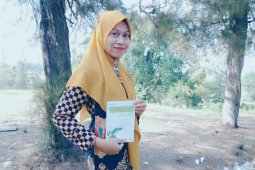 Kegigihan menulis si anak tukang becak