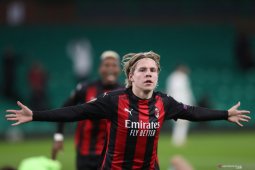 Hauge sumringah setelah  sumbang gol perdana untuk Milan