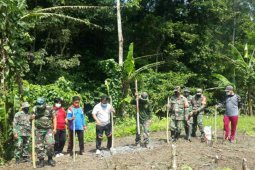 Satgas TMMD ke-109  bantu warga Atinggola-Gorut tanam jagung