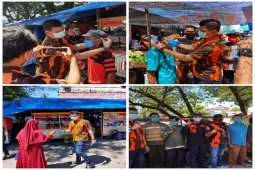 Pemuda Pancasila Stabat bagi 3.000 masker dan 1.000 hand sanitizer