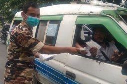 FKPPI Sumut bagikan masker kepada warga Kota Medan