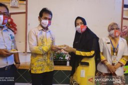 Peringatan HKN digelar virtual dan bagi-bagi masker