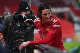 Diego Godin dan Luis Suarez  desak FA cabut skorsing Cavani