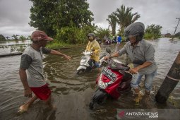 Dampak Luapan Sungai Martapura