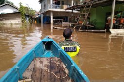 Koramil Jagoi Babang terus pantau kondisi banjir di perbatasan Indonesia